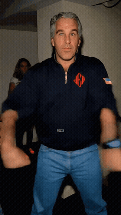 A Man In A Mezza Sweatshirt Is Dancing In A Room GIF