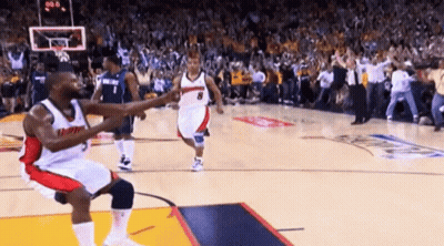 A Man In A Miami Jersey Is Kneeling Down On The Court GIF