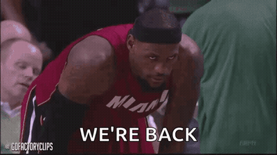 A Man In A Miami Jersey Is Saying " We 'Re Back " GIF