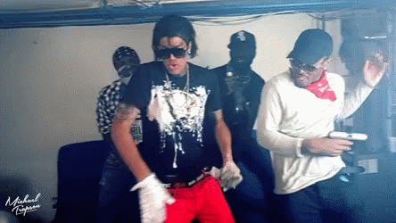 A Man In A Michael Jackson T-Shirt Is Dancing With Other Men GIF