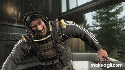 A Man In A Military Uniform Has A Kill Sign On His Chest GIF