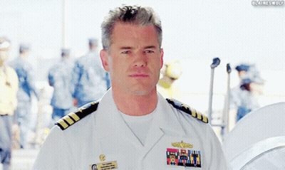 A Man In A Military Uniform Has A Name Tag That Says ' Blaine Wolf ' GIF