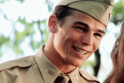 A Man In A Military Uniform Has The Letters U.s.a. On His Collar GIF