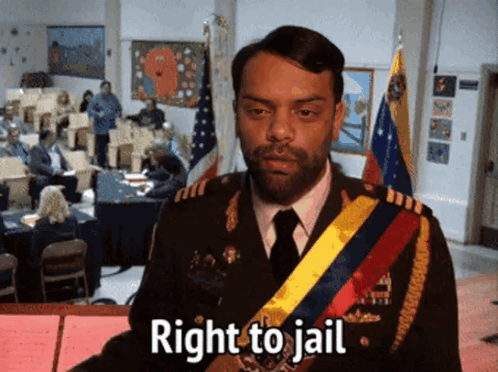 A Man In A Military Uniform Has The Words Right To Jail On His Chest GIF