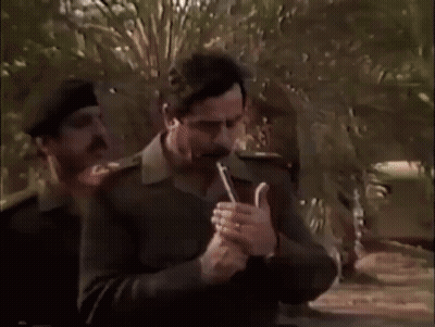 A Man In A Military Uniform Is Blowing A Whistle GIF