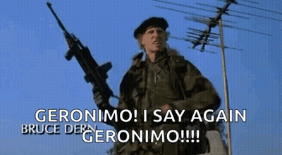 A Man In A Military Uniform Is Holding A Gun And Says Geronimo ! I Say Again Bruce Der Geronimo !!! GIF