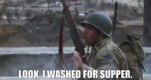 A Man In A Military Uniform Is Holding A Gun And Says `` Look , I Washed For Supper . '' GIF