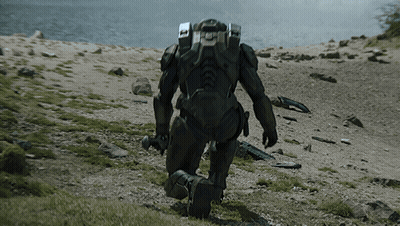 A Man In A Military Uniform Is Kneeling In The Dirt GIF