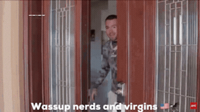 A Man In A Military Uniform Is Peeking Out Of A Door With The Caption Wassup Nerds And Virgins GIF