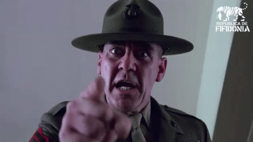 A Man In A Military Uniform Is Pointing At The Camera With Republic Fifidonia Written On The Bottom GIF