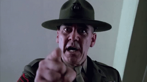 A Man In A Military Uniform Is Pointing With His Finger GIF