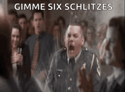 A Man In A Military Uniform Is Screaming In Front Of A Crowd With The Words Gimme Six Schlitzes Written On The Bottom GIF