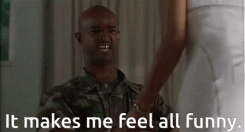 A Man In A Military Uniform Is Shaking Hands With A Woman And Says It Makes Me Feel All Funny . GIF
