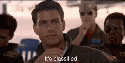 A Man In A Military Uniform Is Sitting In A Classroom With Other Men And Says `` It 'S Classified . '' GIF