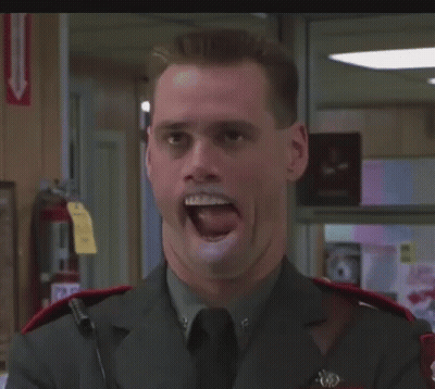 A Man In A Military Uniform Is Smiling And Making A Funny Face GIF
