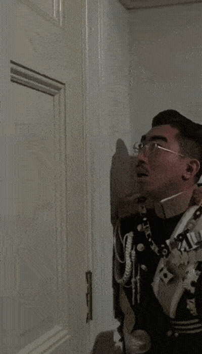 A Man In A Military Uniform Is Smiling And Says Here 'S On The Bottom GIF
