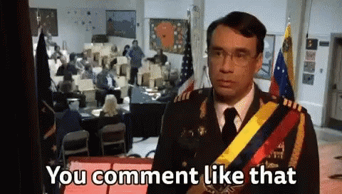 A Man In A Military Uniform Is Standing In Front Of A Crowd And Saying You Comment Like That . GIF