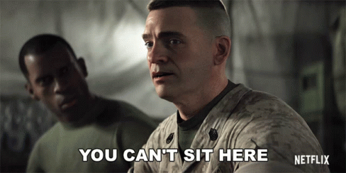 A Man In A Military Uniform Says You Can T Sit Here GIF