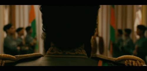 Man In Military Uniform In Front Of Crowd GIF