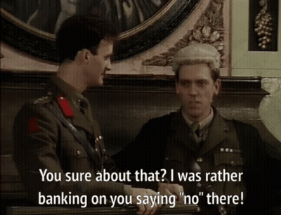 A Man In A Military Uniform Talks To Another Man In A Suit GIF