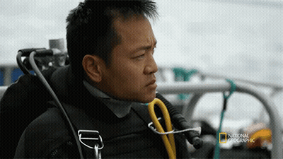 A Man In A National Geographic Scuba Gear GIF