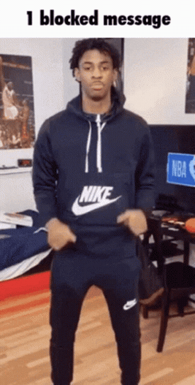 A Man In A Nike Sweatshirt Is Dancing GIF