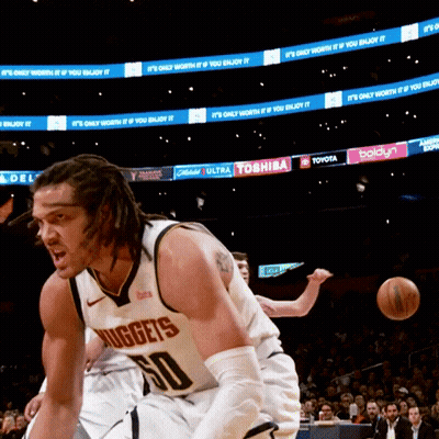 A Man In A Nuggets Jersey Dribbles A Ball GIF