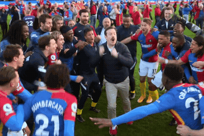 A Man In A Number 21 Jersey Is Surrounded By Other Soccer Players GIF