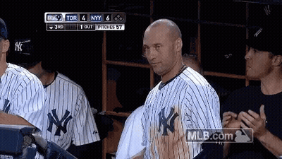A Man In A Ny Yankees Uniform Is Standing In The Dugout GIF