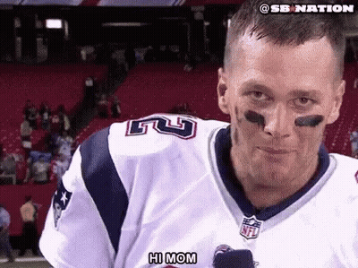A Man In A Patriots Jersey Says Hi Mom In Front Of A Crowd GIF