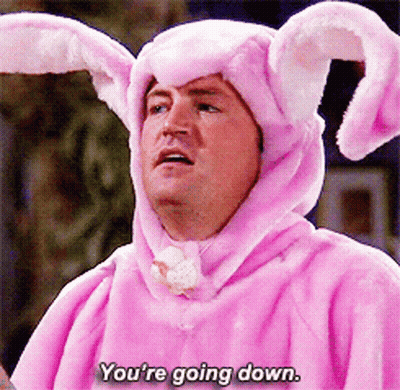 A Man In A Pink Bunny Costume Is Saying You 'Re Going Down GIF