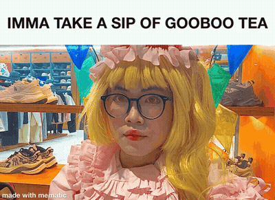 A Man In A Pink Dress With A Yellow Wig And Glasses Says Imma Take A Sip Of Gooboo Tea GIF