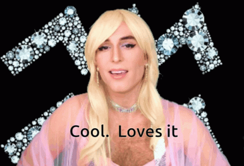 A Man In A Pink Dress With The Words Cool Loves It On The Bottom GIF