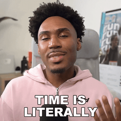 a man in a pink hoodie says " time is literally "