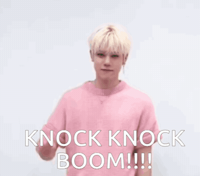 A Man In A Pink Shirt Holds Up His Fist And Says " Knock Knock Boom " GIF
