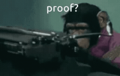 A Man In A Pink Shirt Is Holding A Gun With The Words `` Proof '' Written On It . GIF