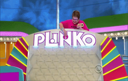 A Man In A Pink Shirt Is Playing A Game Called Punko GIF