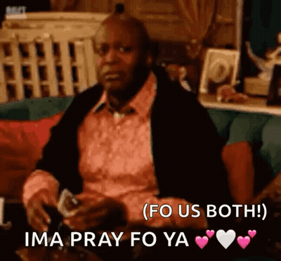 A Man In A Pink Shirt Is Sitting On A Couch Holding A Glass Of Wine And Says Ima Pray Fo Ya . GIF