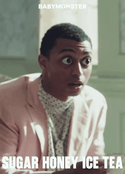 A Man In A Pink Suit With The Words Sugar Honey Ice Tea Written Below Him GIF