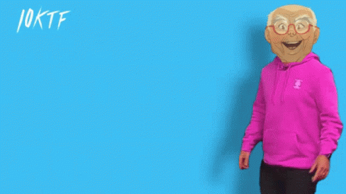 A Man In A Pink Sweatshirt Points To The Word Thursday GIF