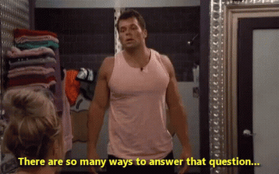 A Man In A Pink Tank Top Is Standing In Front Of A Mirror With The Words There Are So Many Ways To Answer That Question GIF