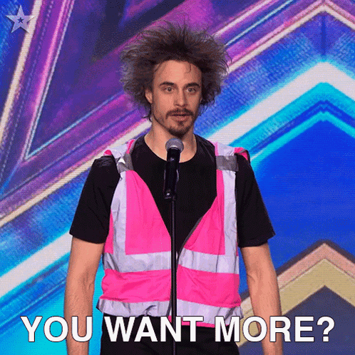 A Man In A Pink Vest Stands In Front Of A Microphone With The Words " You Want More " Below Him GIF