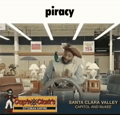 A Man In A Pirate Costume Is Driving A Steering Wheel In A Store . GIF