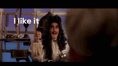 A Man In A Pirate Costume Is Holding A Glass Of Wine And Saying I Like It GIF