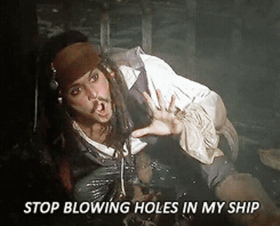 A Man In A Pirate Costume Is Saying Stop Blowing Holes In My Ship GIF