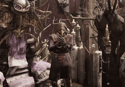 A Man In A Plague Doctor Costume Stands In Front Of A Skeleton GIF