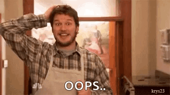 A Man In A Plaid Shirt And Apron Is Holding His Head And Saying `` Oops '' . GIF