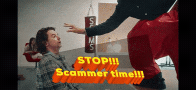 A Man In A Plaid Shirt Is Being Kicked In The Face By A Man In Red Shorts GIF