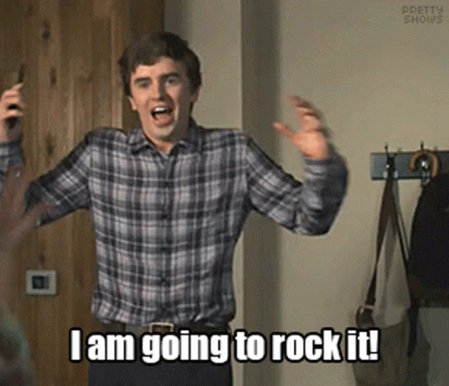 A Man In A Plaid Shirt Is Dancing And Saying I Am Going To Rock It ! GIF