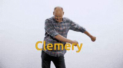 A Man In A Plaid Shirt Is Dancing With The Word Clemery Behind Him GIF
